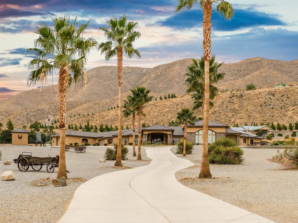 21055 Hazel Road Apple Valley, CA 92308 - Photo 1 of 1 a view of a terrace with a water view