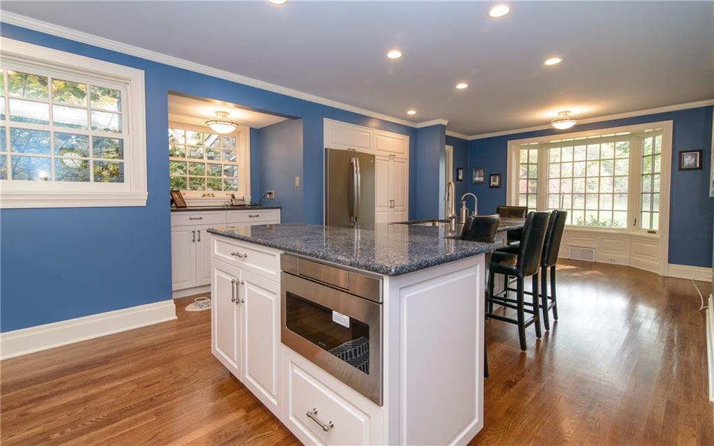 268 Merriman Road Sewickley Heights, PA 15143 - Photo 12 of 25 This is the other end of the Kitchen showing the microwave in the island and the bay window where the table would go. The views are gorgeous.
