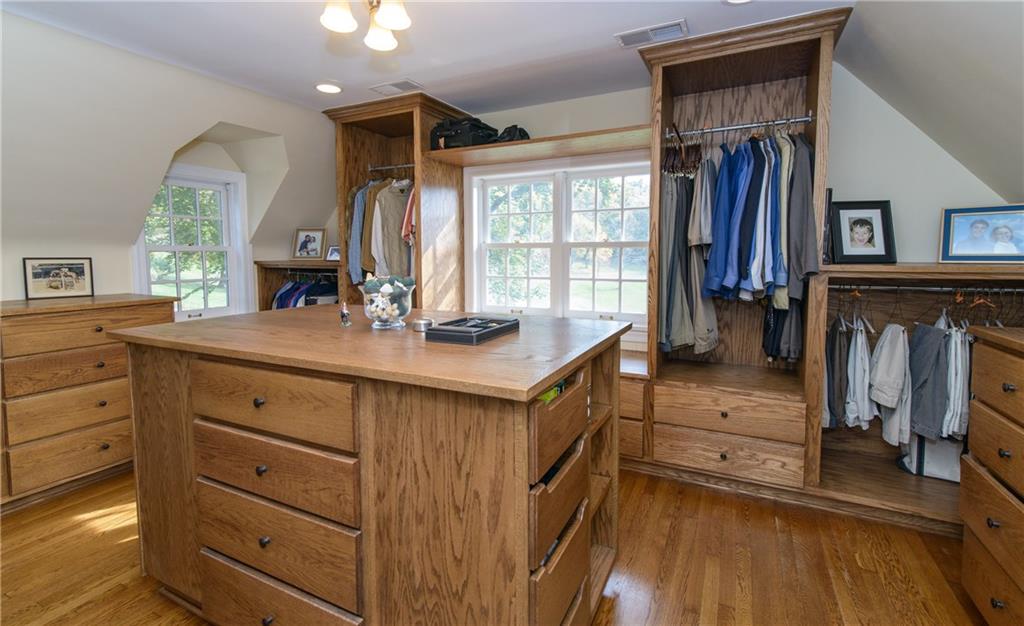 268 Merriman Road Sewickley Heights, PA 15143 - Photo 17 of 25 The dressing room for the Master has drawers, hanging space, shoe shelves, a vanity and lots of natural light.