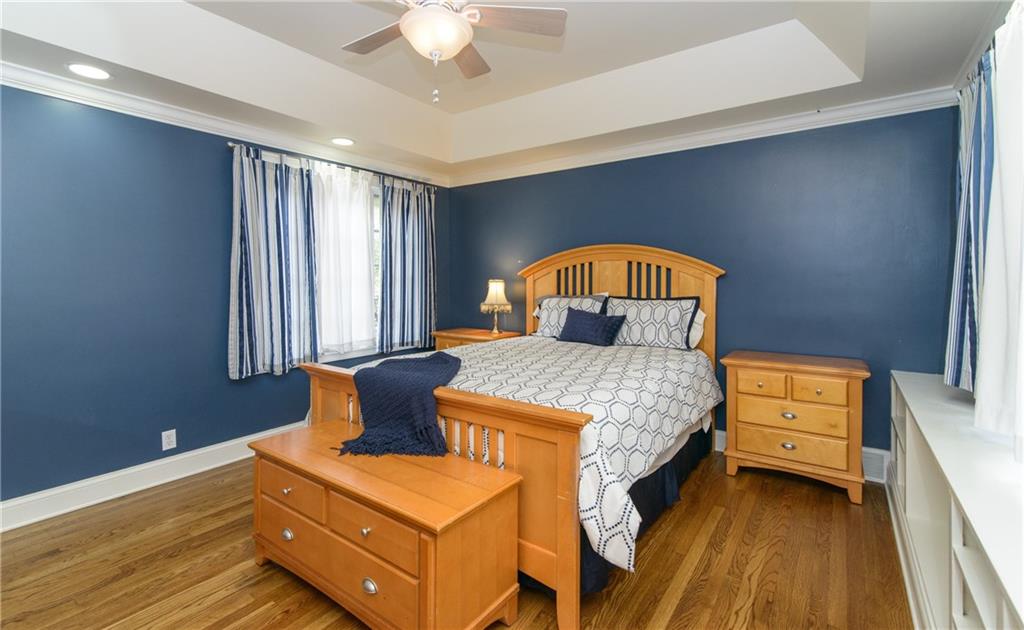 268 Merriman Road Sewickley Heights, PA 15143 - Photo 20 of 25 Third Bedroom has beautiful floors lots of natural light, built in shelving and is next to the hall bathroom.