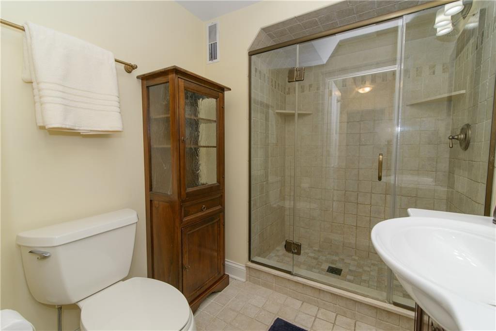 268 Merriman Road Sewickley Heights, PA 15143 - Photo 21 of 25 Hall Bathroom has large shower, ceramic flooring is recently renovated.