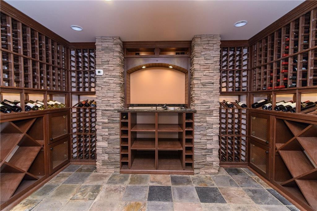 268 Merriman Road Sewickley Heights, PA 15143 - Photo 23 of 25 The wine room on the lower level, is temperature controlled and beautifully constructed. Ceramic tile flooring.