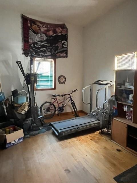 2029 Perry Highway Volant, PA 16156 - Photo 11 of 30 a room with gym equipment and wooden floor