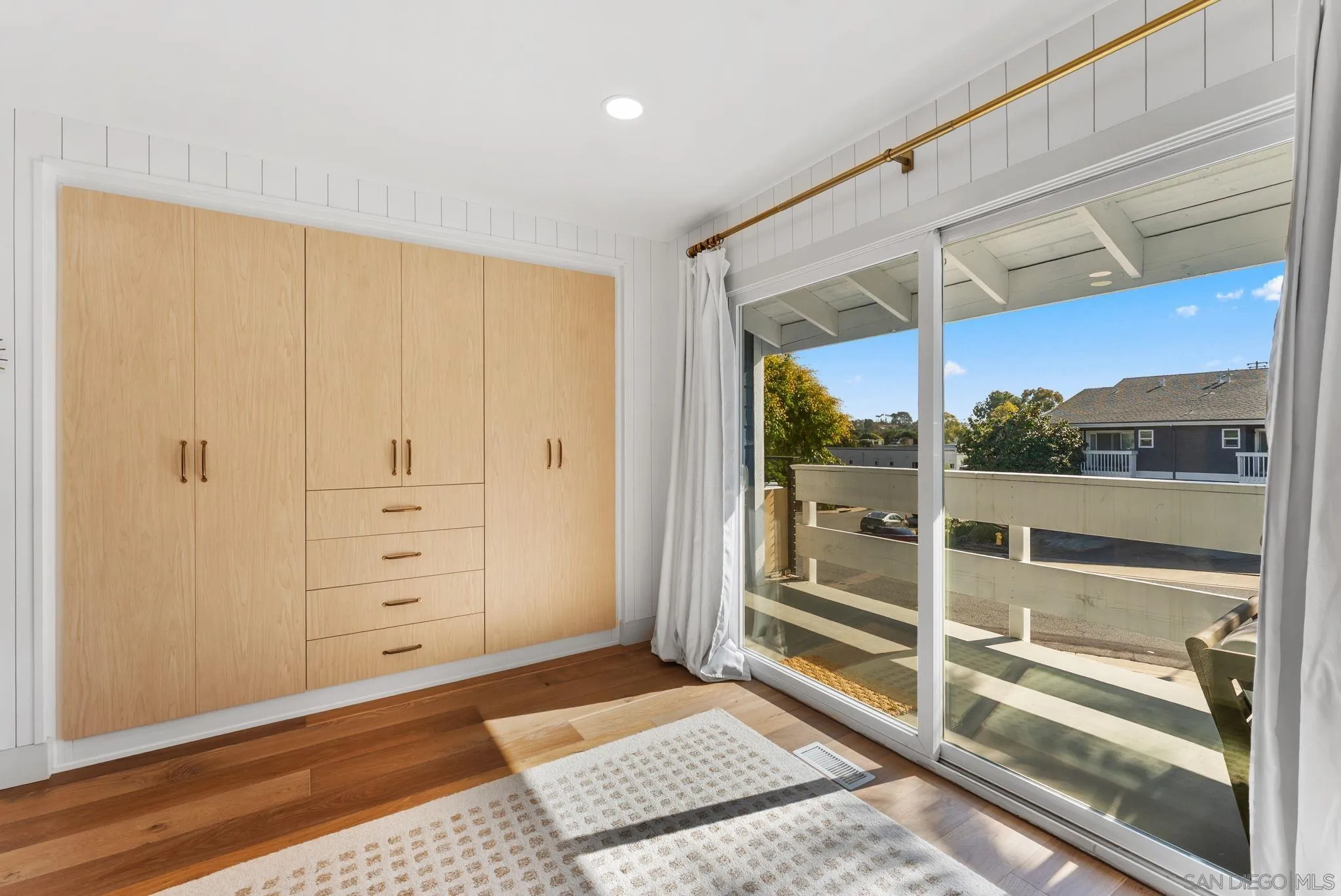 144 Coop Court Encinitas, CA 92024 - Photo 18 of 28 workspace with wooden floor and windows