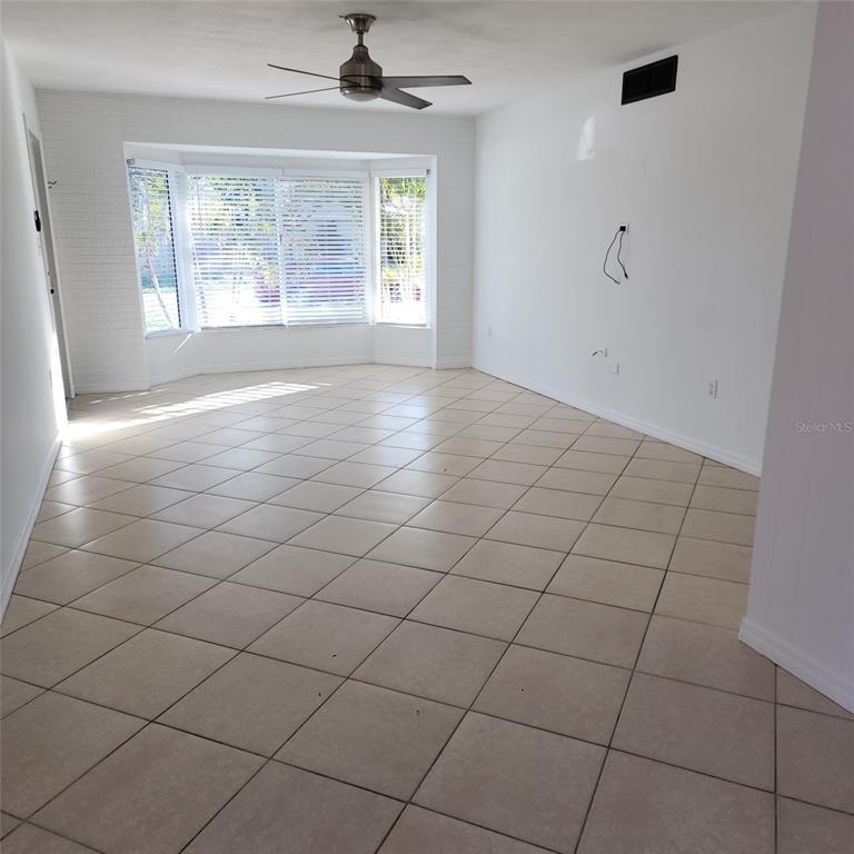 3925 Omega Lane Sarasota, FL 34235 - Photo 12 of 22 a view of an empty room and window