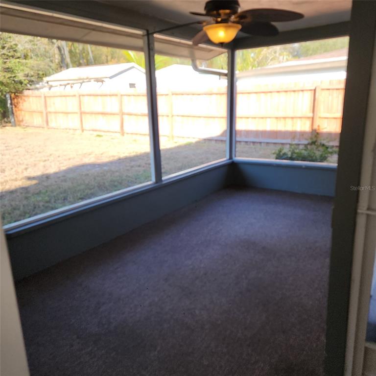 3925 Omega Lane Sarasota, FL 34235 - Photo 19 of 22 a view of an empty room with a window