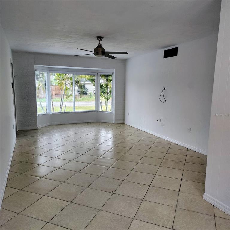 3925 Omega Lane Sarasota, FL 34235 - Photo 9 of 22 a view of an empty room and window