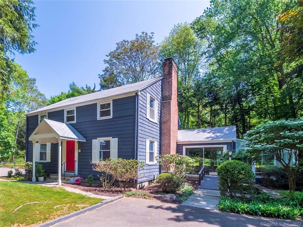 44 Compo Road North Westport, CT 06880 - Photo 1 of 1 a front view of a house with yard