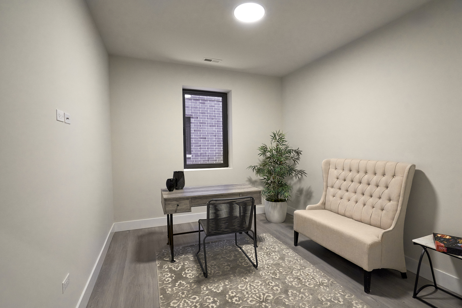 503 East Pershing Road, Unit 303 Chicago, IL 60653 - Photo 29 of 29 a living room with furniture and a potted plant