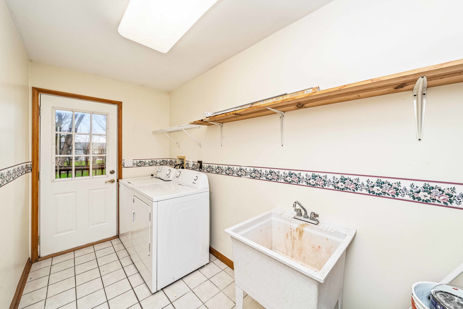 1839 Irene Road Lake Holiday, IL 60548 - Photo 12 of 19 a bathroom with a sink a mirror and a shower
