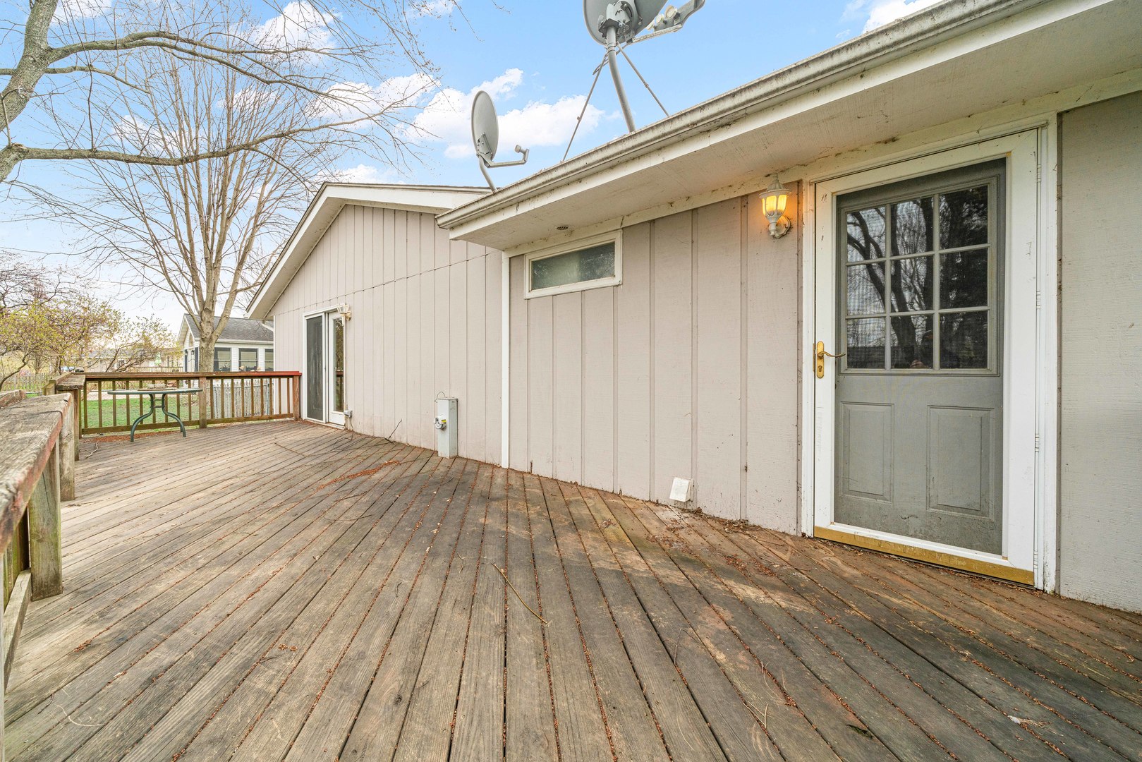 1839 Irene Road Lake Holiday, IL 60548 - Photo 14 of 19 a view of a house with a wooden deck