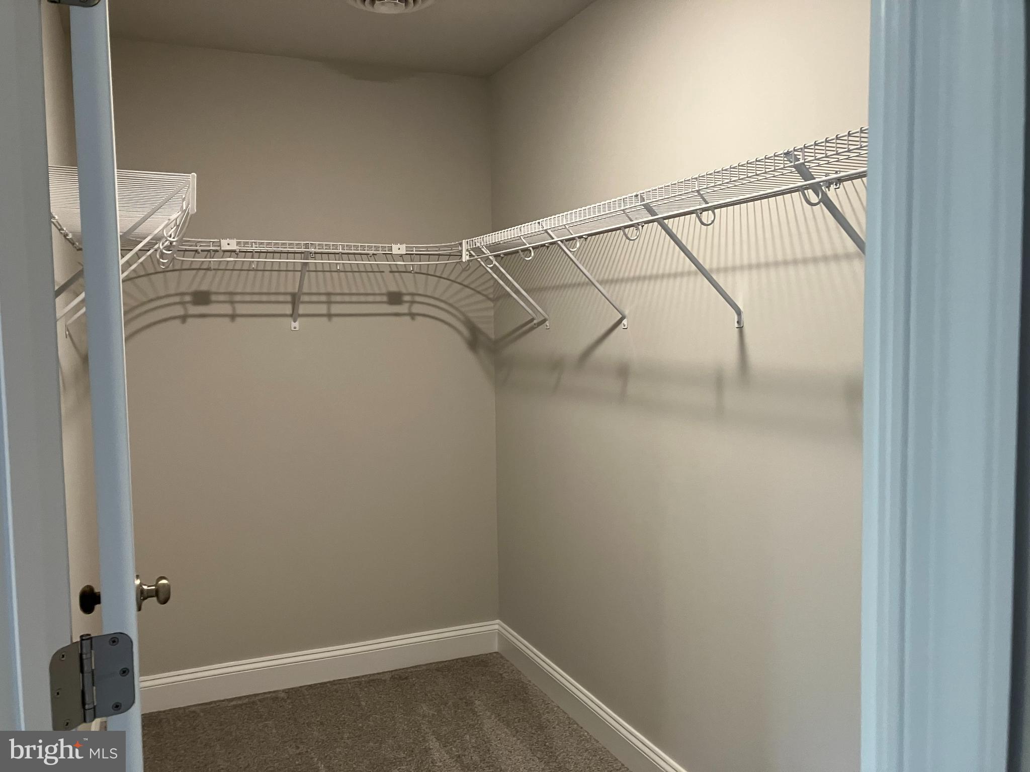 21131 Striper Run Rock Hall, MD 21661 - Photo 8 of 9 a view of a room with racks on the wall