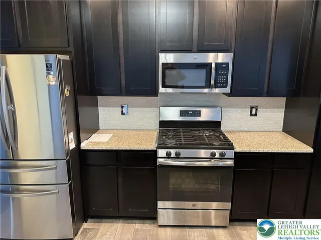 a view of staircase with railing and a stairs