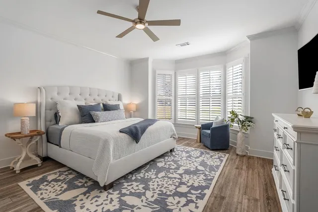 a bedroom with a bed and a closet