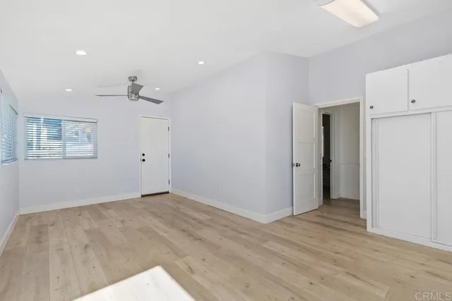 an aerial view of residential building and ocean