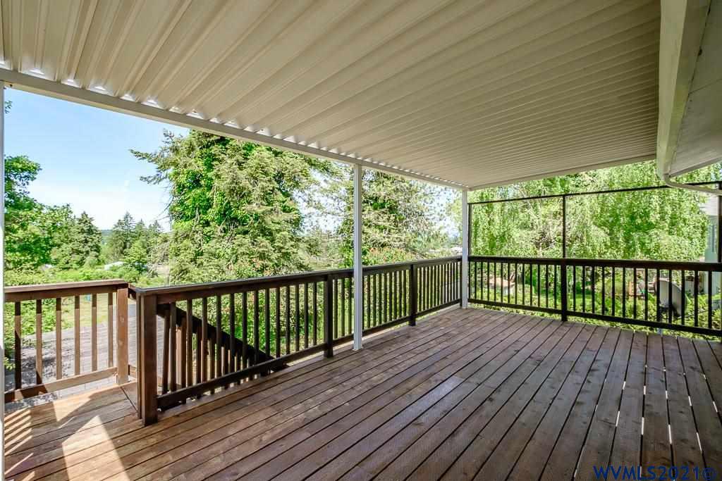 1278 Southwest Maple Street Dallas, OR 97338 - Photo 33 of 42 a view of balcony with wooden floor
