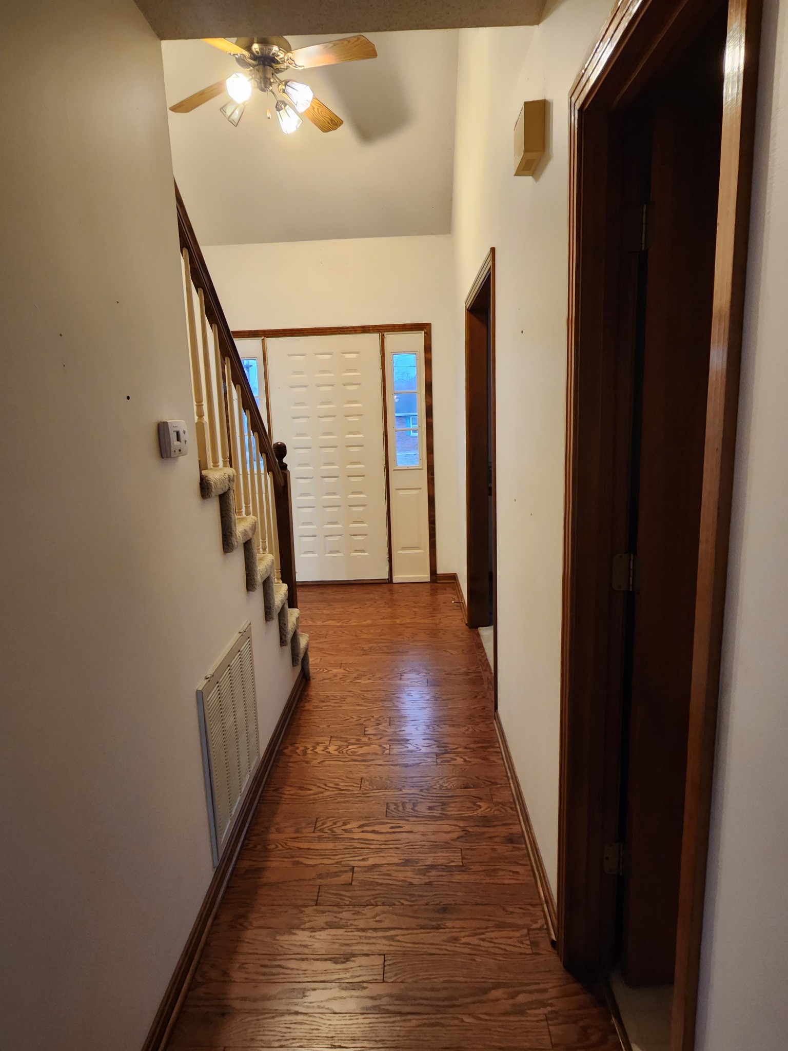 819 Branch Bend Road Clarksville, TN 37040 - Photo 23 of 24 a view of a hallway with wooden floor and staircase