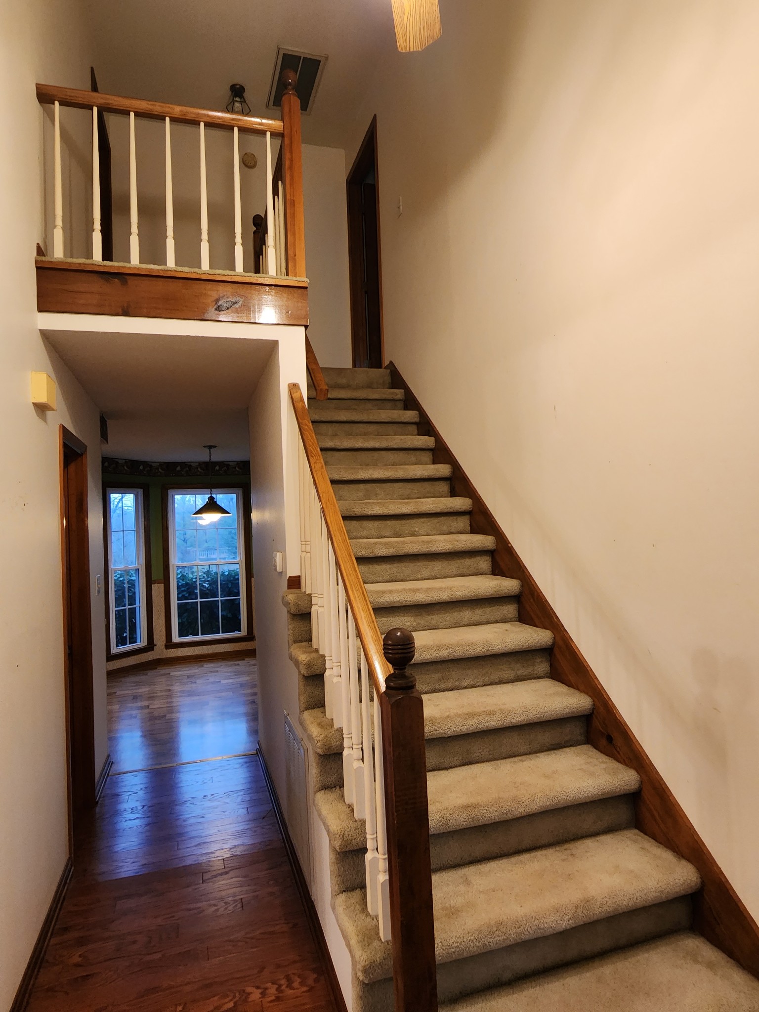 819 Branch Bend Road Clarksville, TN 37040 - Photo 24 of 24 a view of a hallway with wooden floor and stairs