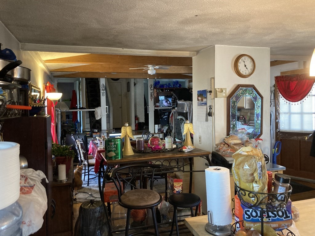 662 Main Street Haverhill, MA 01830 - Photo 15 of 23 a view of a dining area with furniture and chandelier