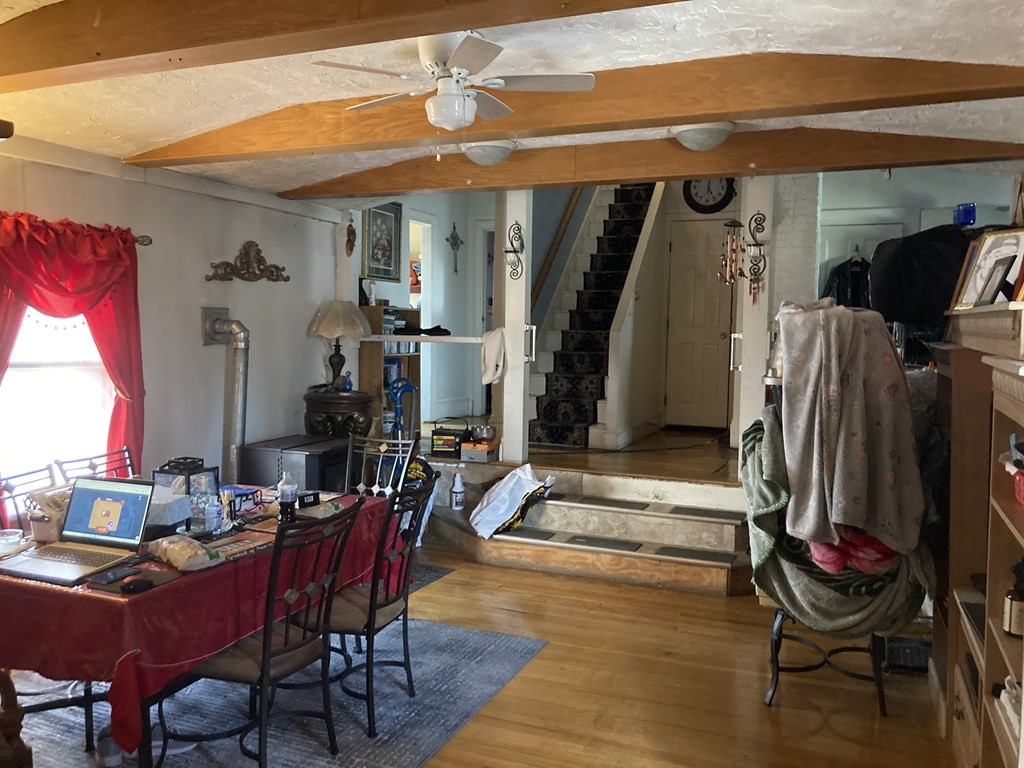 662 Main Street Haverhill, MA 01830 - Photo 17 of 23 a view of a livingroom with furniture and a window