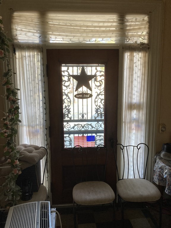 662 Main Street Haverhill, MA 01830 - Photo 20 of 23 a view of a livingroom with furniture and a window