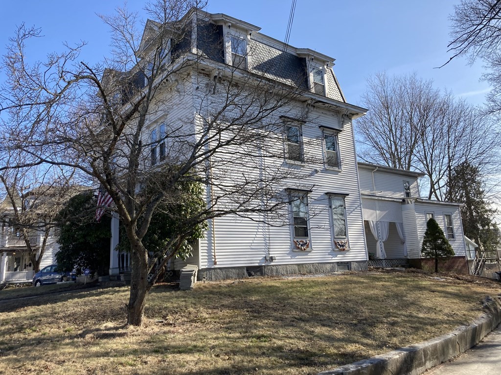 662 Main Street Haverhill, MA 01830 - Photo 4 of 23 a view of a house with a yard