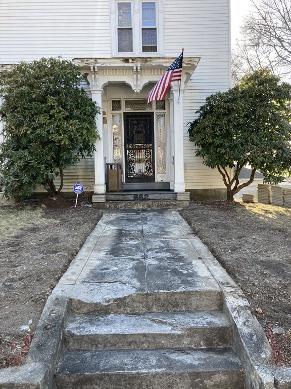 662 Main Street Haverhill, MA 01830 - Photo 5 of 23 a front view of a house with garden
