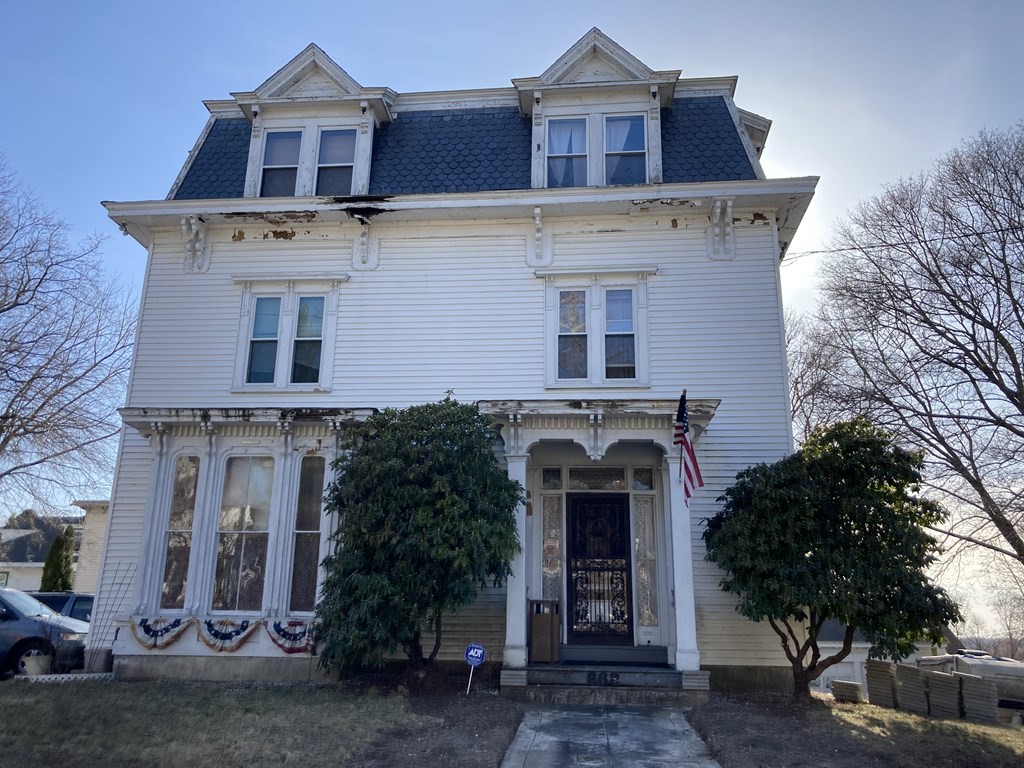 662 Main Street Haverhill, MA 01830 - Photo 6 of 23 a view of a house with a tree and front door