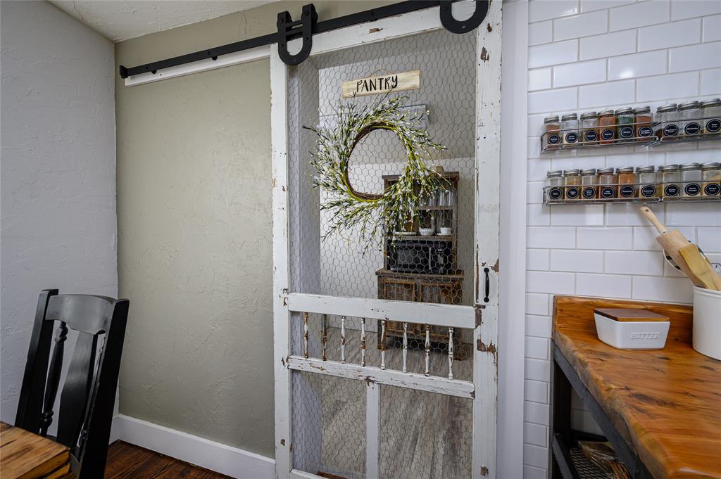 4597 West Line Road Whitesboro, TX 76273 - Photo 17 of 31 a view of a kitchen from a living room