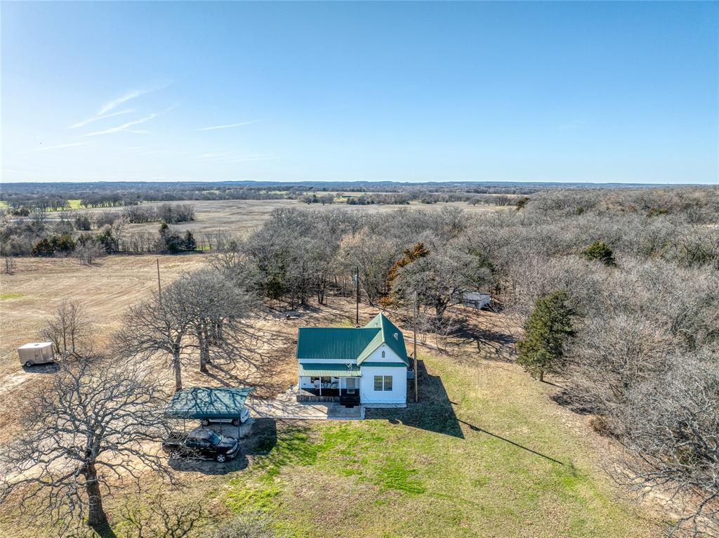 4597 West Line Road Whitesboro, TX 76273 - Photo 31 of 31 an aerial view of a house with a yard