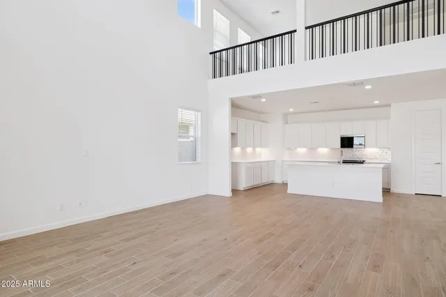 a view of kitchen with wooden floor