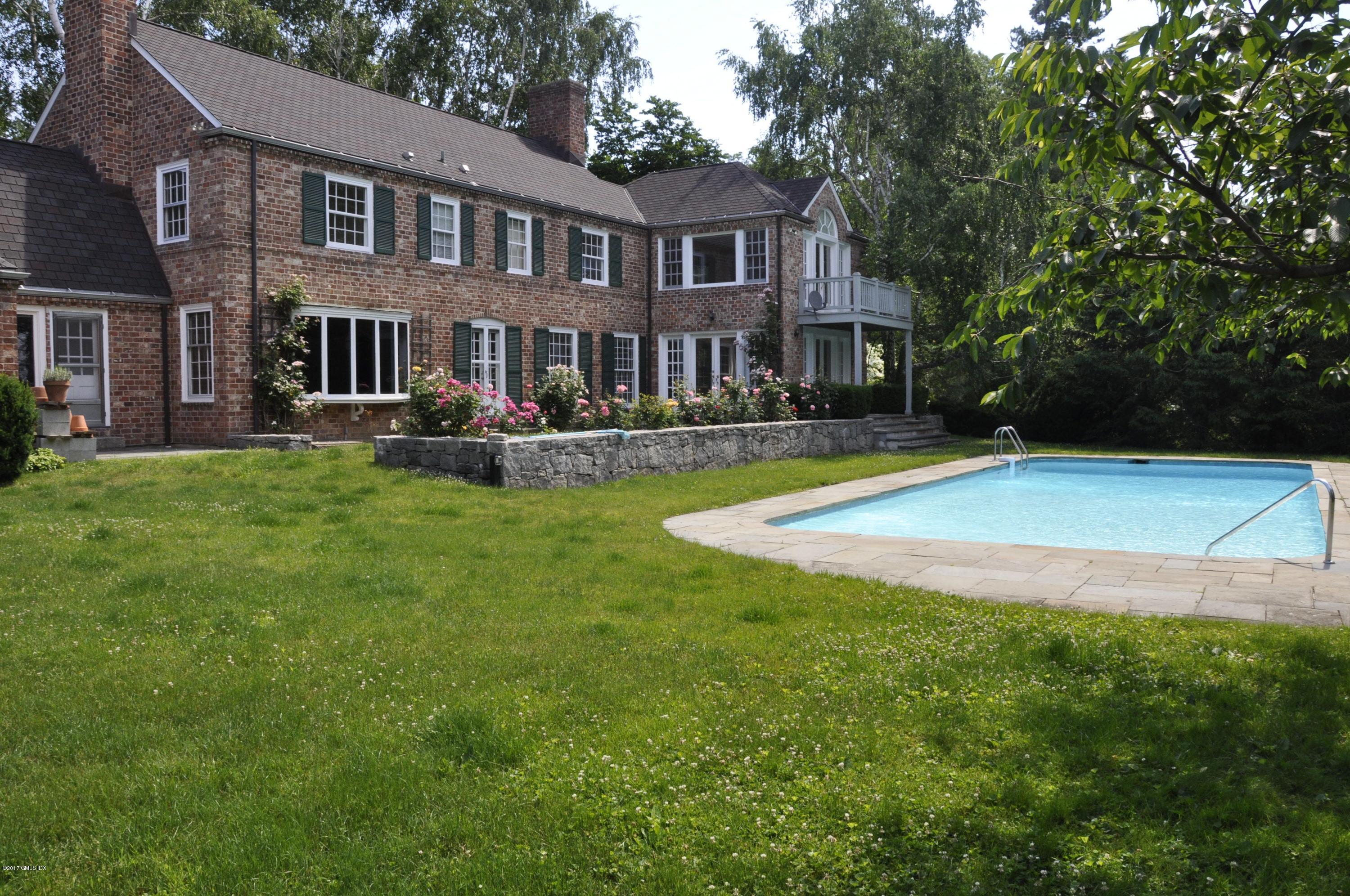 57 Gilliam Lane Riverside, CT 06878 - Photo 3 of 5 a view of a house with a yard porch and sitting area