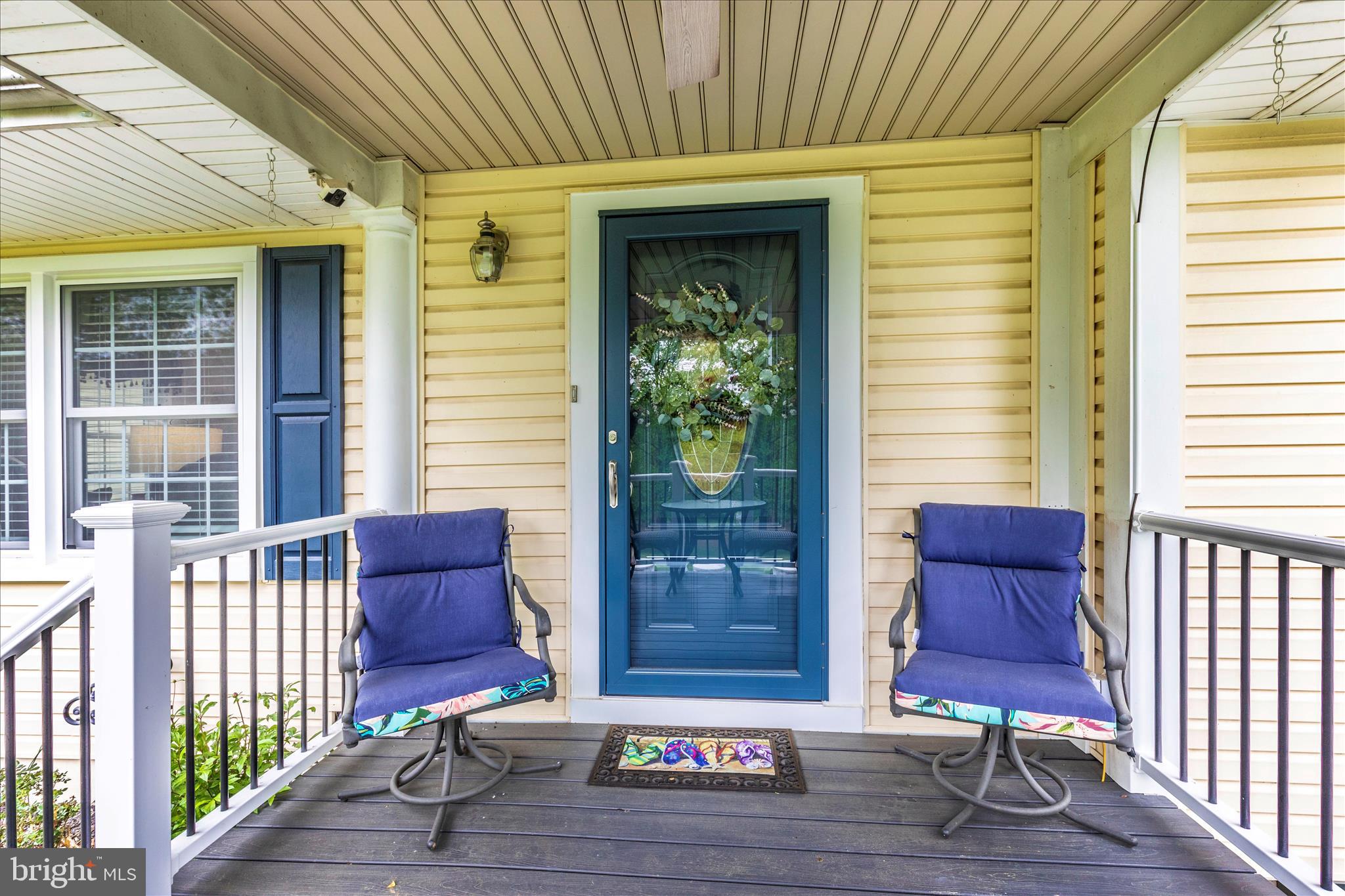 1676 Monument Road Middletown, MD 21769 - Photo 3 of 61 a view of a two chairs in the balcony