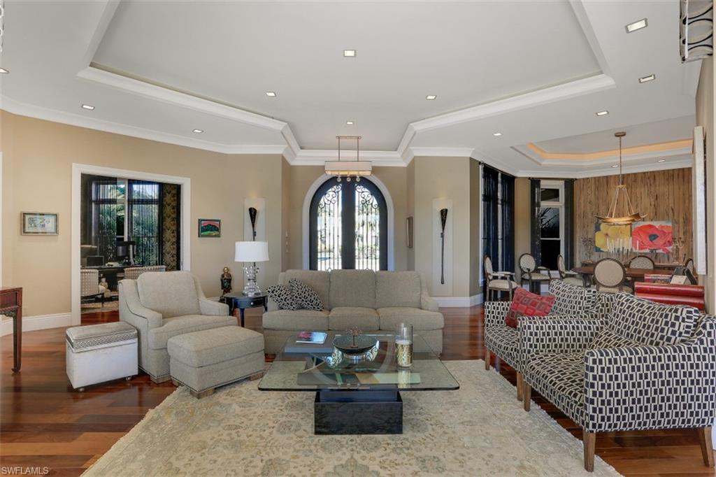 2343 Alexander Palm Naples, FL 34105 - Photo 4 of 35 a living room with furniture