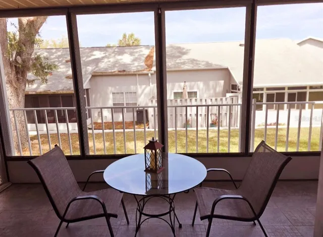 a view of a room with furniture window and outside view