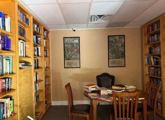 a view of a workspace with furniture and toys