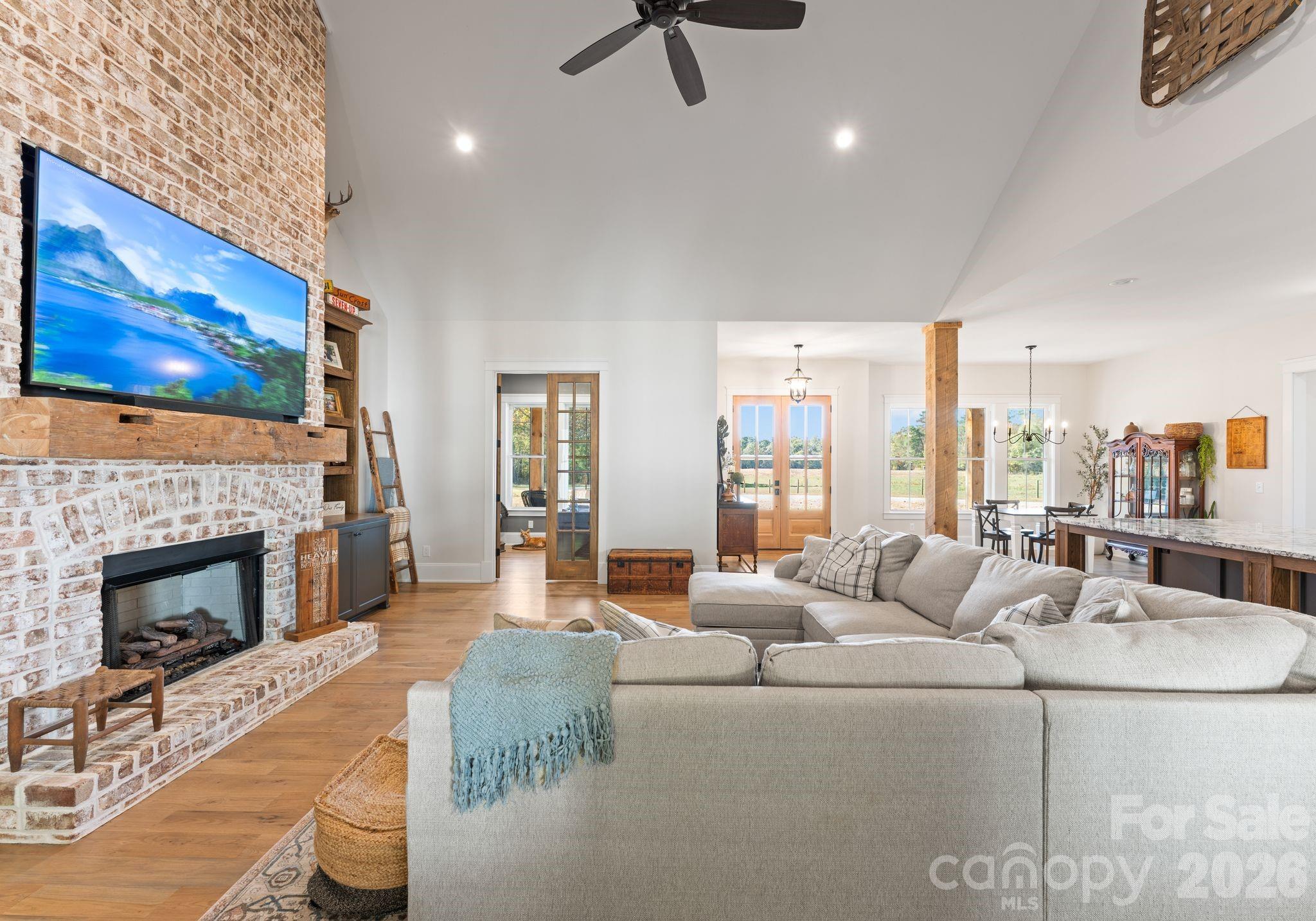 3760 Cappadocia Church Road Polkton, NC 28135 - Photo 15 of 48 a living room with furniture and a fireplace