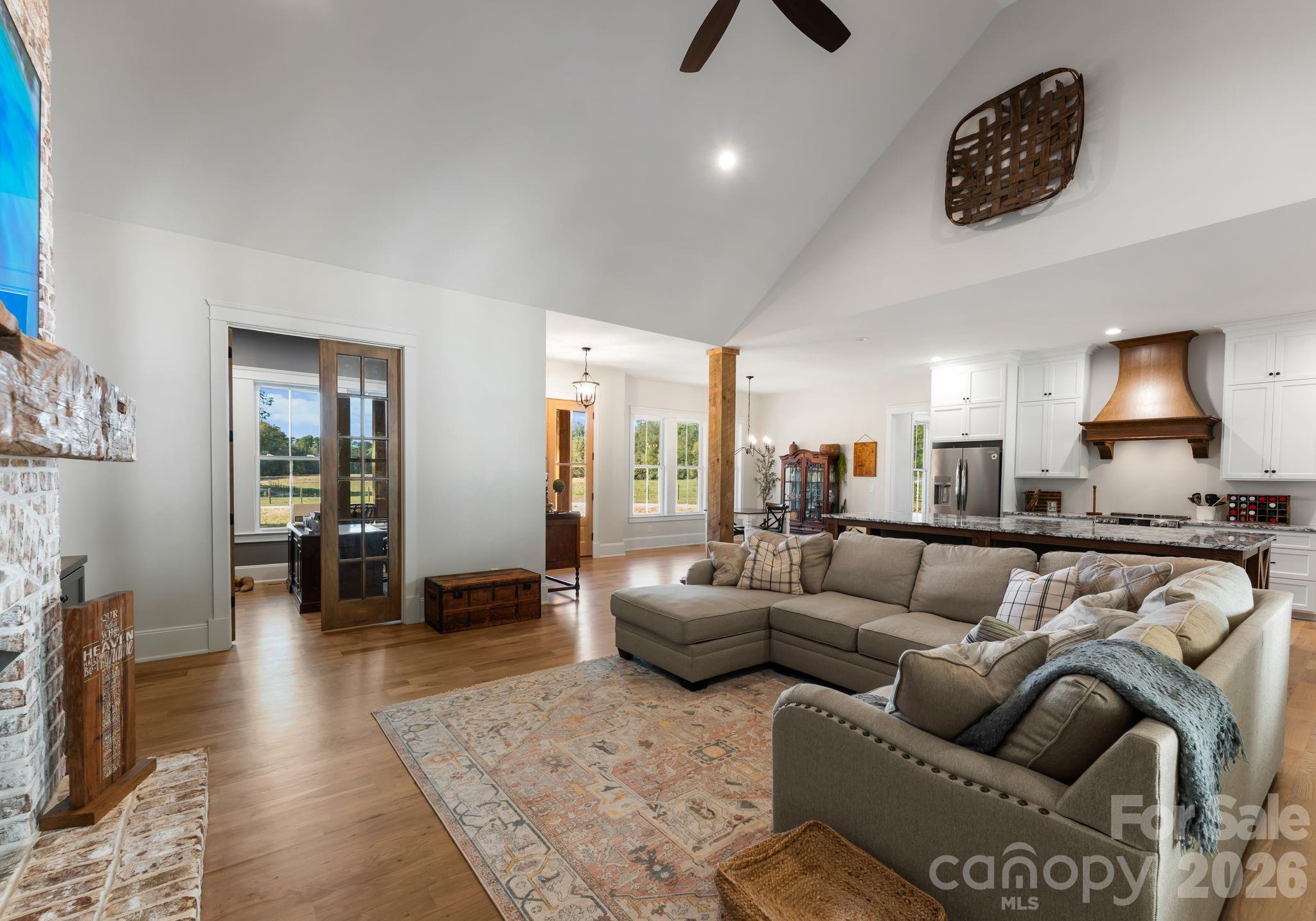 3760 Cappadocia Church Road Polkton, NC 28135 - Photo 16 of 48 a living room with furniture and a wooden floor