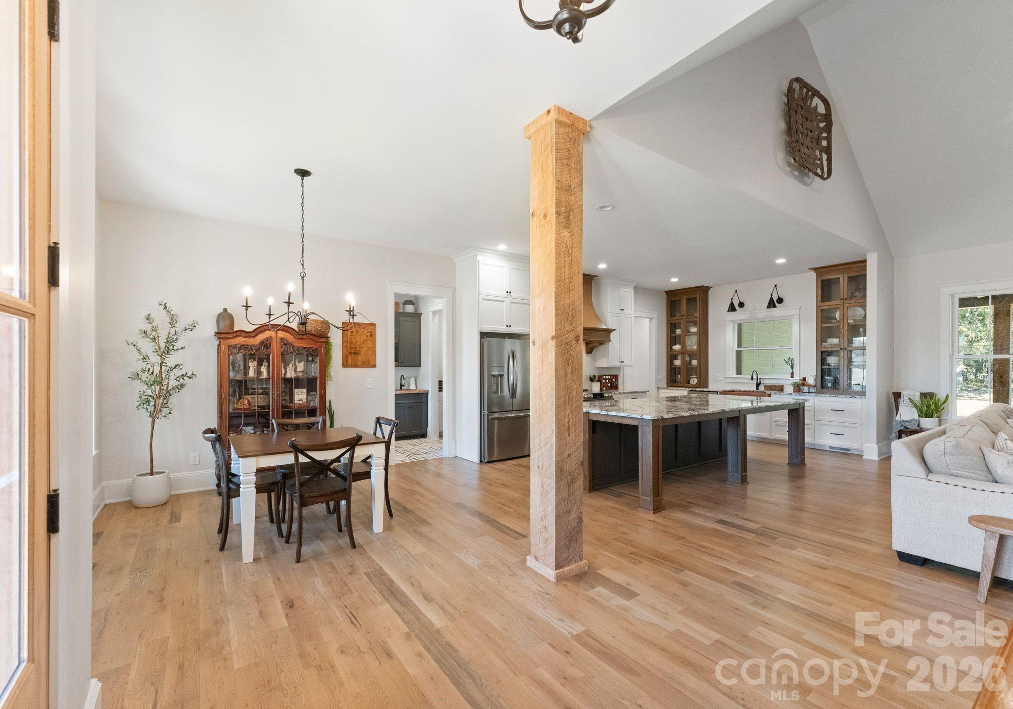 3760 Cappadocia Church Road Polkton, NC 28135 - Photo 18 of 48 a view of a dining room with furniture and wooden floor