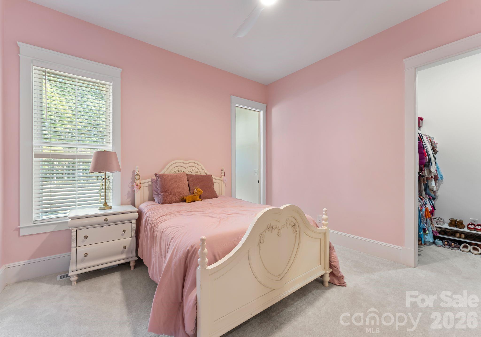 3760 Cappadocia Church Road Polkton, NC 28135 - Photo 24 of 48 a bedroom with a bed and a window