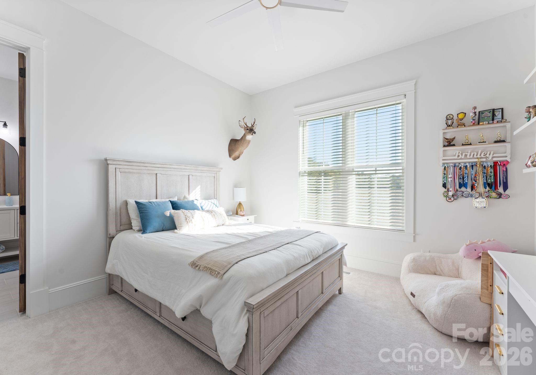 3760 Cappadocia Church Road Polkton, NC 28135 - Photo 25 of 48 a bedroom with a bed and a window