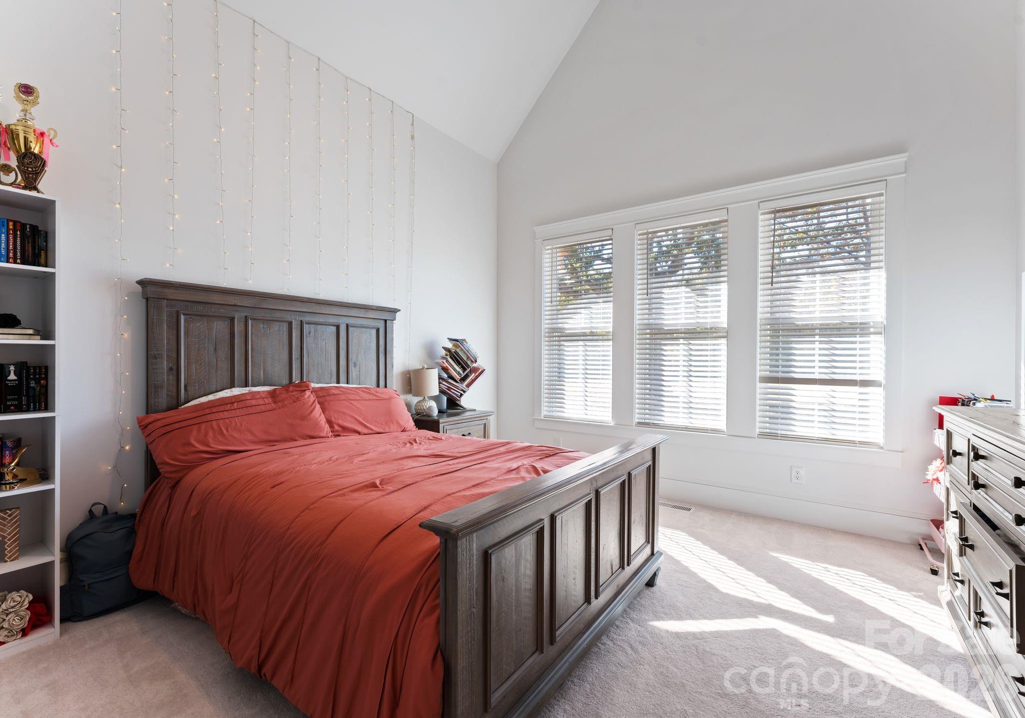 3760 Cappadocia Church Road Polkton, NC 28135 - Photo 27 of 48 a bedroom with a bed a baby crib and a window