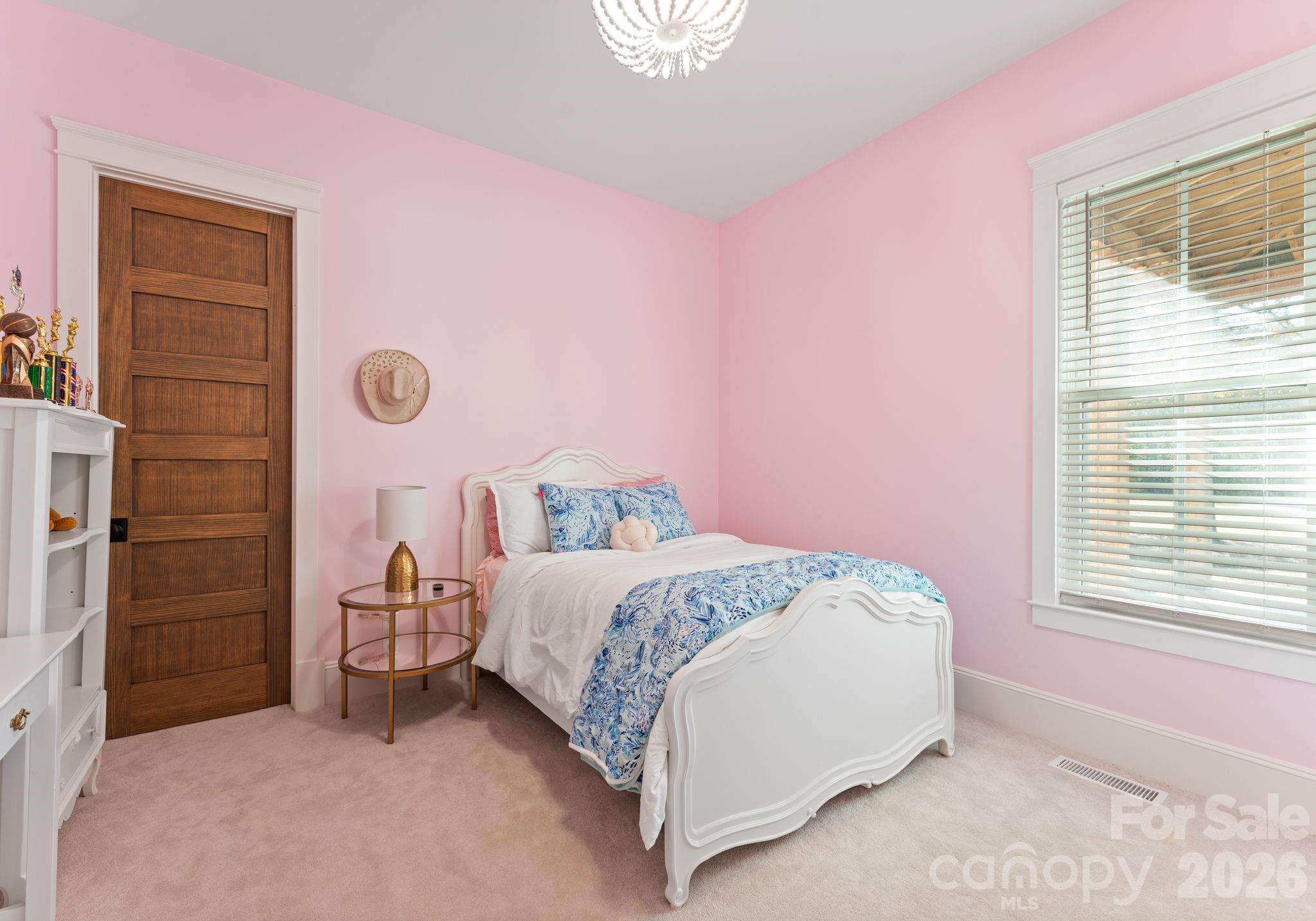 3760 Cappadocia Church Road Polkton, NC 28135 - Photo 28 of 48 a bedroom with a bed and a window