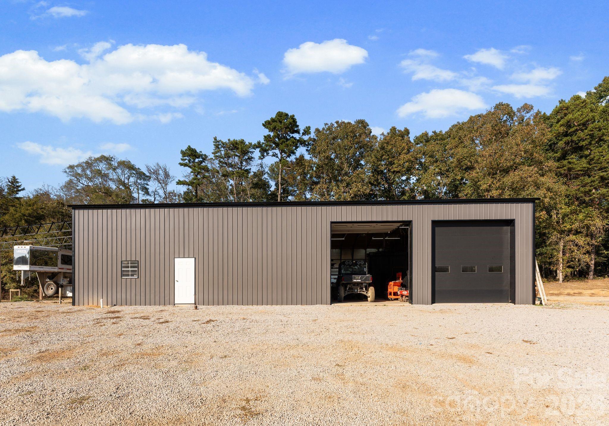 3760 Cappadocia Church Road Polkton, NC 28135 - Photo 39 of 48 front view of a house with a yard and garage