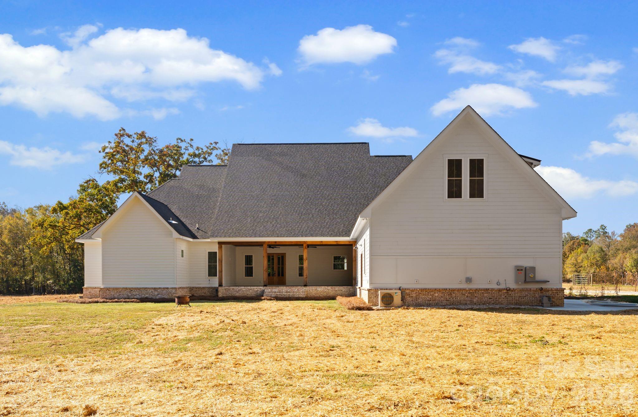 3760 Cappadocia Church Road Polkton, NC 28135 - Photo 44 of 48 a view of house with yard and covered in snow