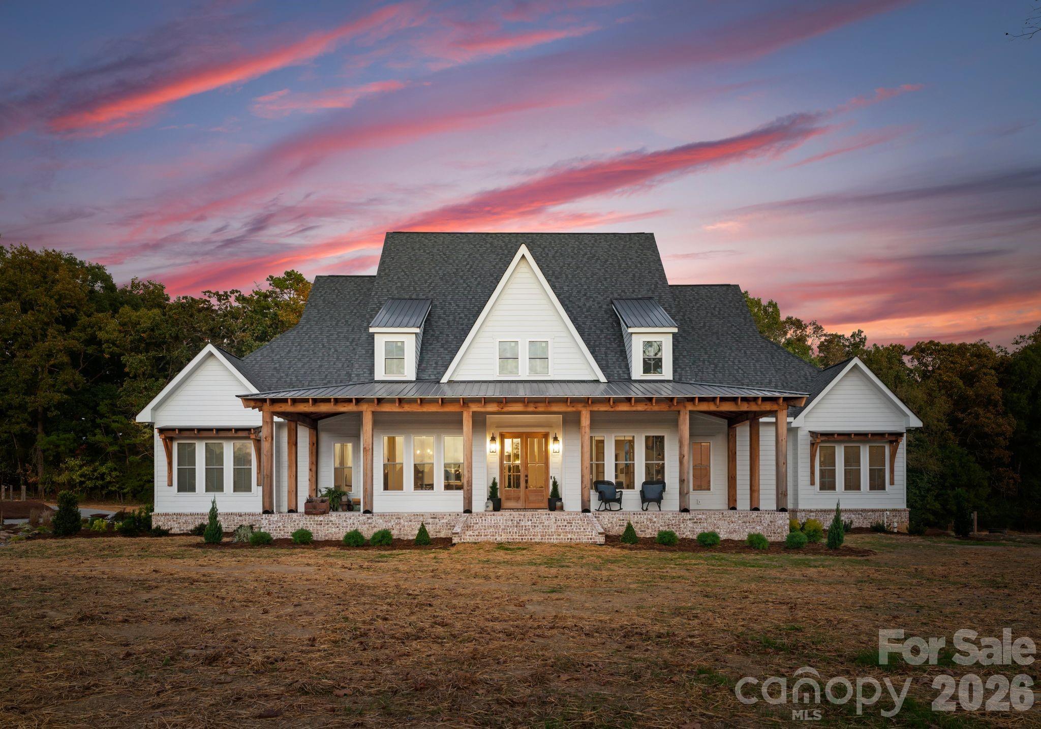 3760 Cappadocia Church Road Polkton, NC 28135 - Photo 47 of 48 a front view of a house with garden