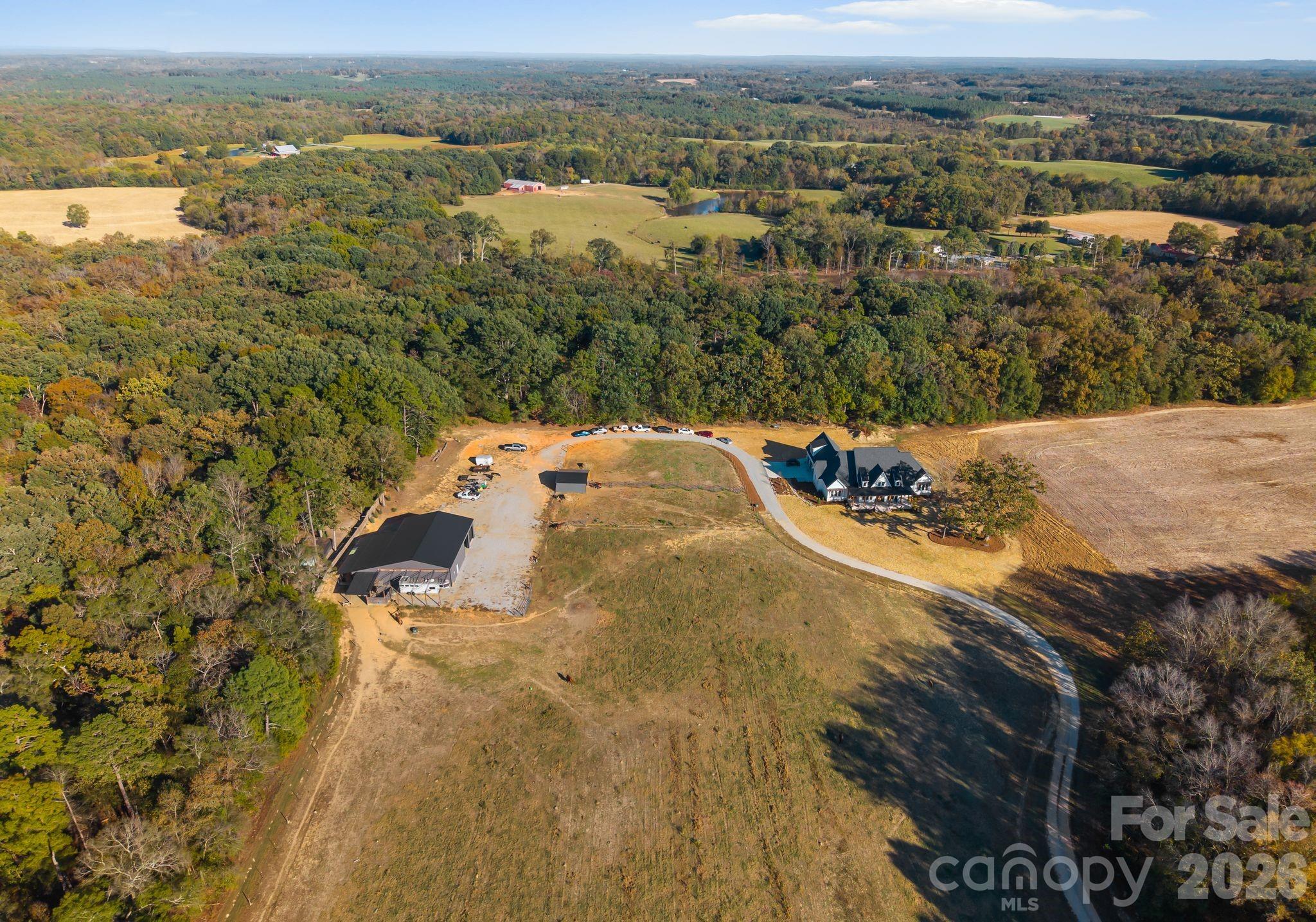 3760 Cappadocia Church Road Polkton, NC 28135 - Photo 48 of 48 an aerial view of residential houses with outdoor space