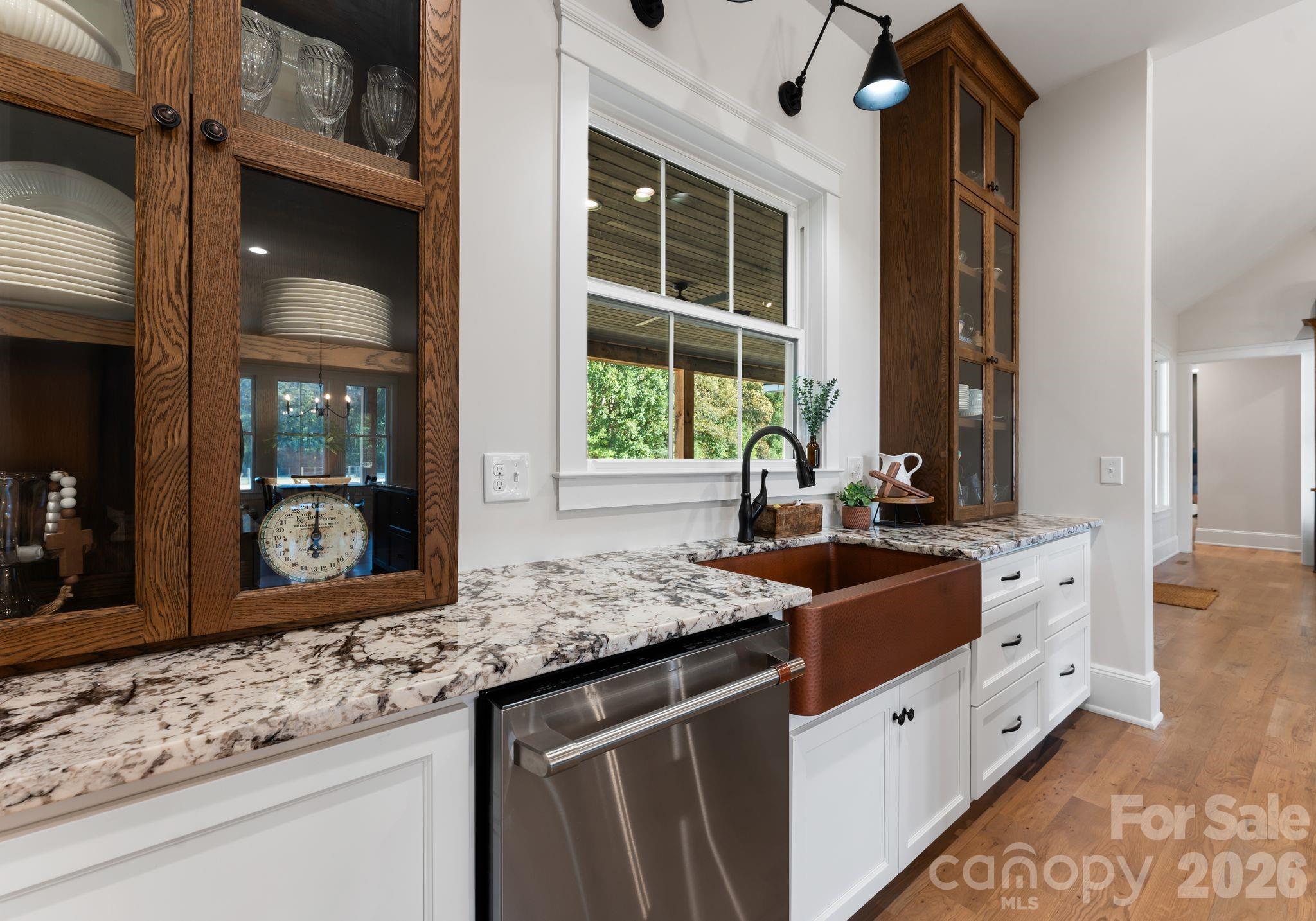 3760 Cappadocia Church Road Polkton, NC 28135 - Photo 6 of 48 a kitchen with granite countertop a sink and a stove