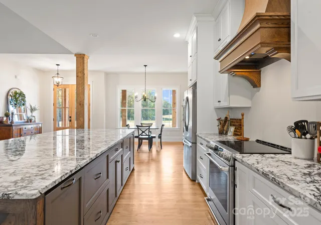 a kitchen with granite countertop lots of counter top space