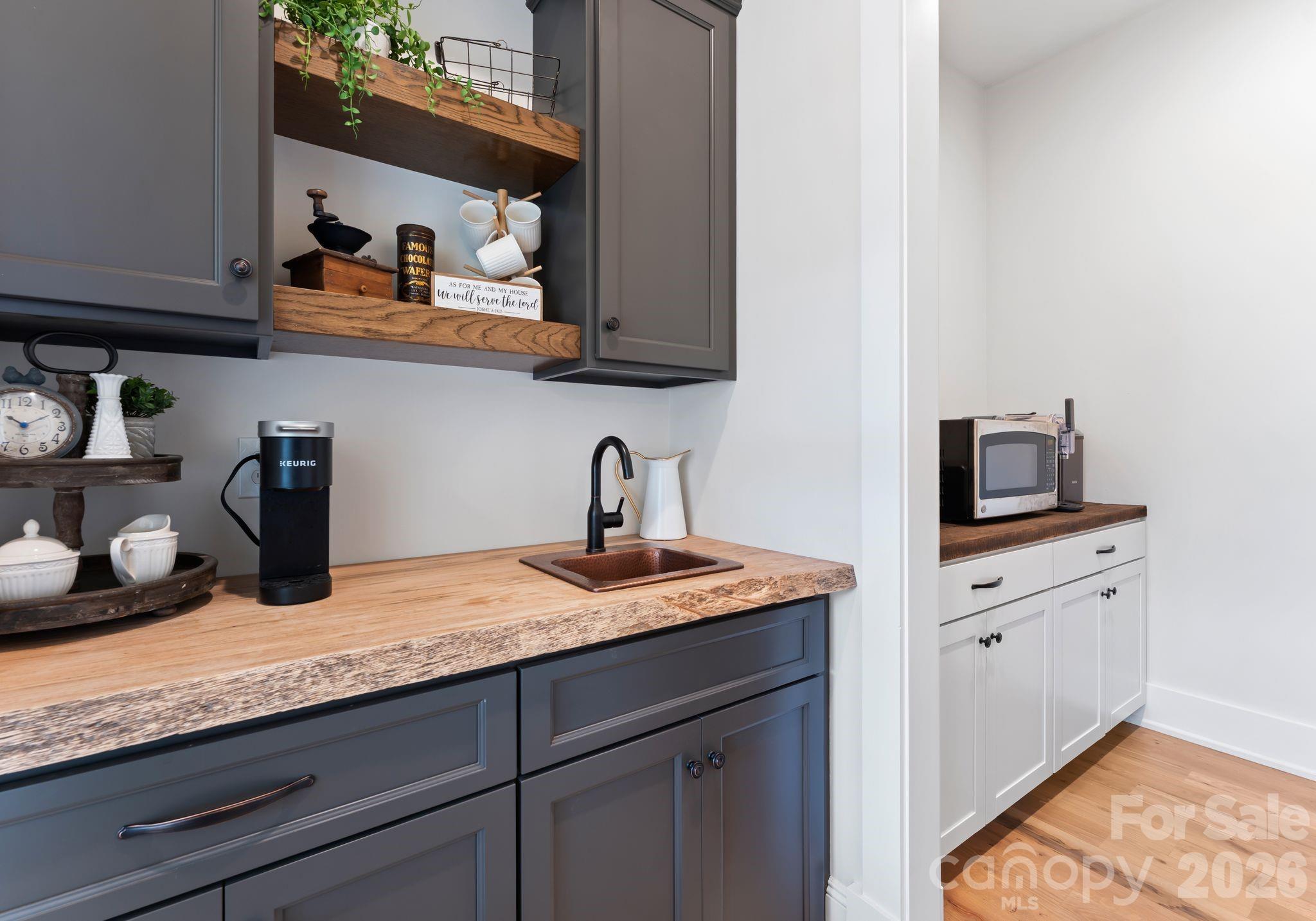 3760 Cappadocia Church Road Polkton, NC 28135 - Photo 10 of 48 a kitchen with granite countertop stainless steel appliances a sink a stove and cabinets